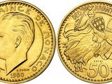 a gold coin with a picture of a man riding a horse
