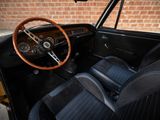the interior of an old car with a steering wheel and dashboard