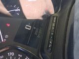 a close up of a car dashboard with a speedometer