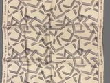 an image of a black and white scarf with a pattern on it