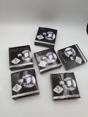 six boxes of black and white photos of a man and woman