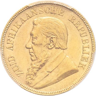 l'image d'une pièce d'or sur laquelle figure le visage d'un homme