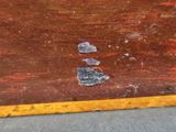 a piece of wood that has been left on the floor