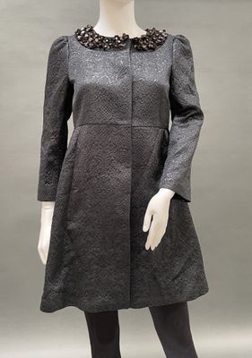 grey dress with black collar and cuffs on mannequin mannequin mannequin mannequin mannequin mannequin mannequin mannequin