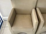 two chairs that are sitting next to each other on the floor