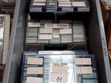 a large container full of cards and other items on the floor