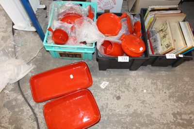many plastic containers that are sitting on the floor