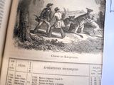 un livre ouvert avec l'image d'un homme et d'un chien