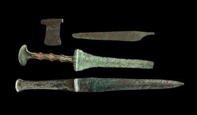 several different types of knives are displayed on a black background