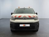 citroen van with red and white stripes parked in a white room