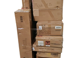 many boxes stacked on top of each other on a pallet