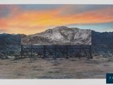 an image of a picture of a desert with a mountain in the background