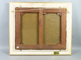 an old picture frame with a piece of writing on the inside of it