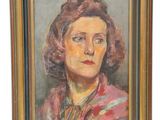 painting of a woman in a red dress in a gold frame