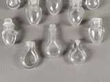 a lot of empty glass bottles sitting on a table