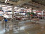 a large warehouse filled with lots of boxes and equipment
