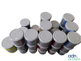 many cans of paint sitting on top of each other