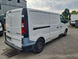 a white van that is parked in a parking lot