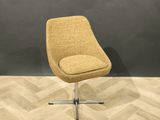an image of a yellow chair sitting on top of a wooden floor