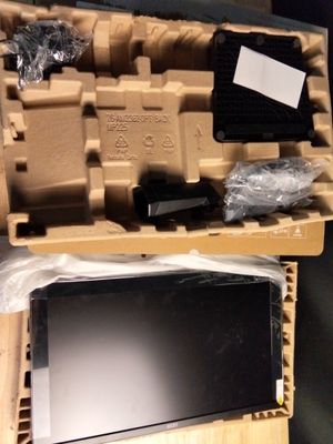 a box with a laptop inside of it sitting on a table