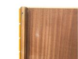 a close up picture of a wooden book with a yellow cover