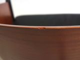 a close up of a wooden bowl on a table