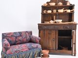two couches and a cabinet in a room