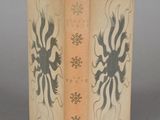 a book that has a picture of a dragon on it