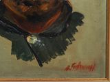 portrait of a man in a hat and scarf with a pipe in his mouth