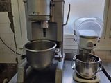 an image of a kitchen with a mixer and a bowl on the counter