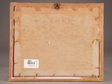 an old picture frame with a piece of paper on it
