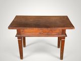an old wooden table with a drawer underneath it on a white background