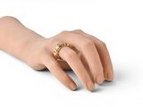 an image of a woman ' s hand with a gold ring on it ' s finger