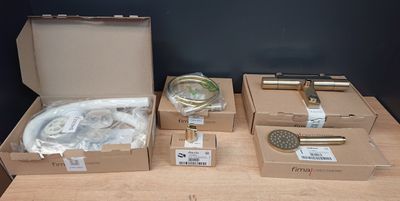 three boxes of items on a table with a box of soap