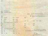 a picture of a certificate issued to a man who is driving a car