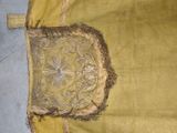 a piece of fabric with a decorative design on it