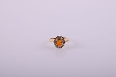 Bague en or sertie d'une citrine de forme ovale et entourée … - Photo 1