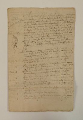 a piece of paper with writing on it sitting on top of a table