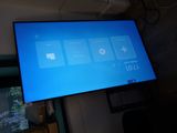 a flat screen tv that is hanging on the wall