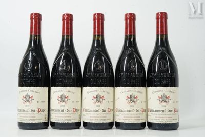 six bottles of wine are lined up in a row