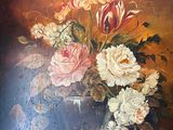 a painting of flowers in a vase on a table