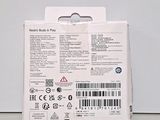 packaging of a white cell phone with a barcode on the back