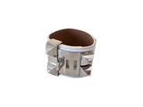 silver metal cuff bracelet with spikes and spikes on the sides