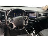 the interior of a car with a steering wheel, dashboard, and dashboard controls