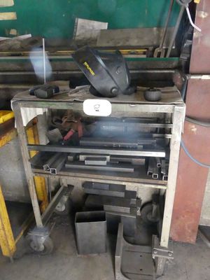 a picture of a machine that is working on a piece of metal