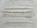 a close up of a piece of paper with writing on it