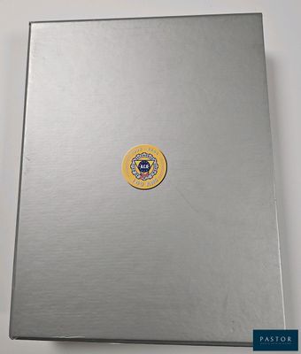 an open laptop computer sitting on top of a white table