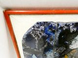 a picture of a picture of a rock in a picture frame