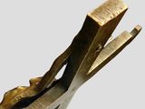 a close up of a pair of scissors on a white surface