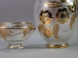 two vases that are sitting next to each other